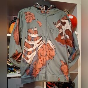 Green Zip Hoodie with Orange/Brown Grunge Bone Print